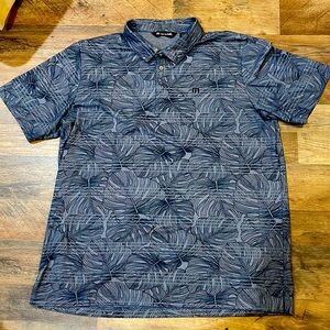 NWOT Travis Mathew Polo beach theme.